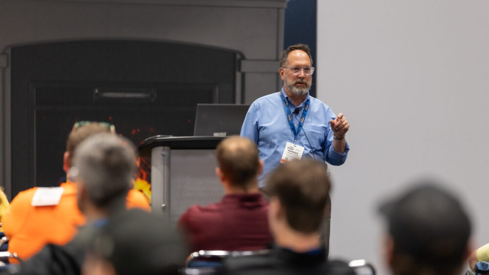 An instructor leading a Business Bootcamp session at HPBExpo