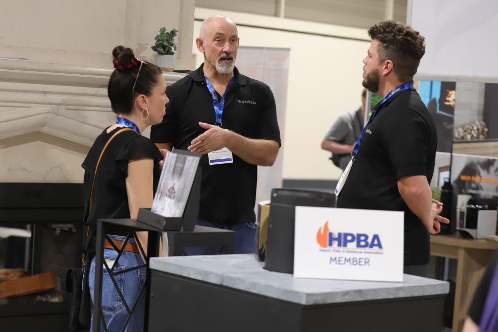 Exhibitors and attendees on the HPBExpo show floor