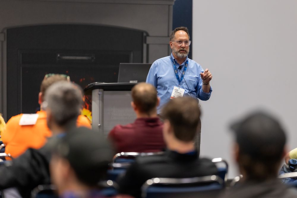 A speaker presenting to a full room at an HPBExpo education session